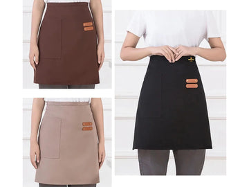 Four aprons in different colors on a white background