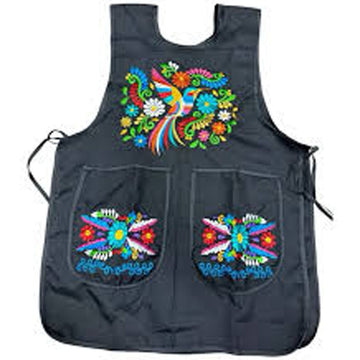 Black apron with colorful floral embroidery on a white background
