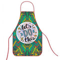 A colorful apron with a red neck loop and waist ties, featuring a vibrant green, yellow, and blue mandala pattern. A large white circular graphic in the center reads 'let's DO this' in stylized lettering.