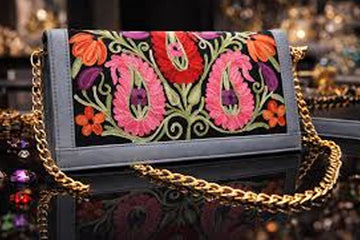 Floral Embroidered Bag on a black surface