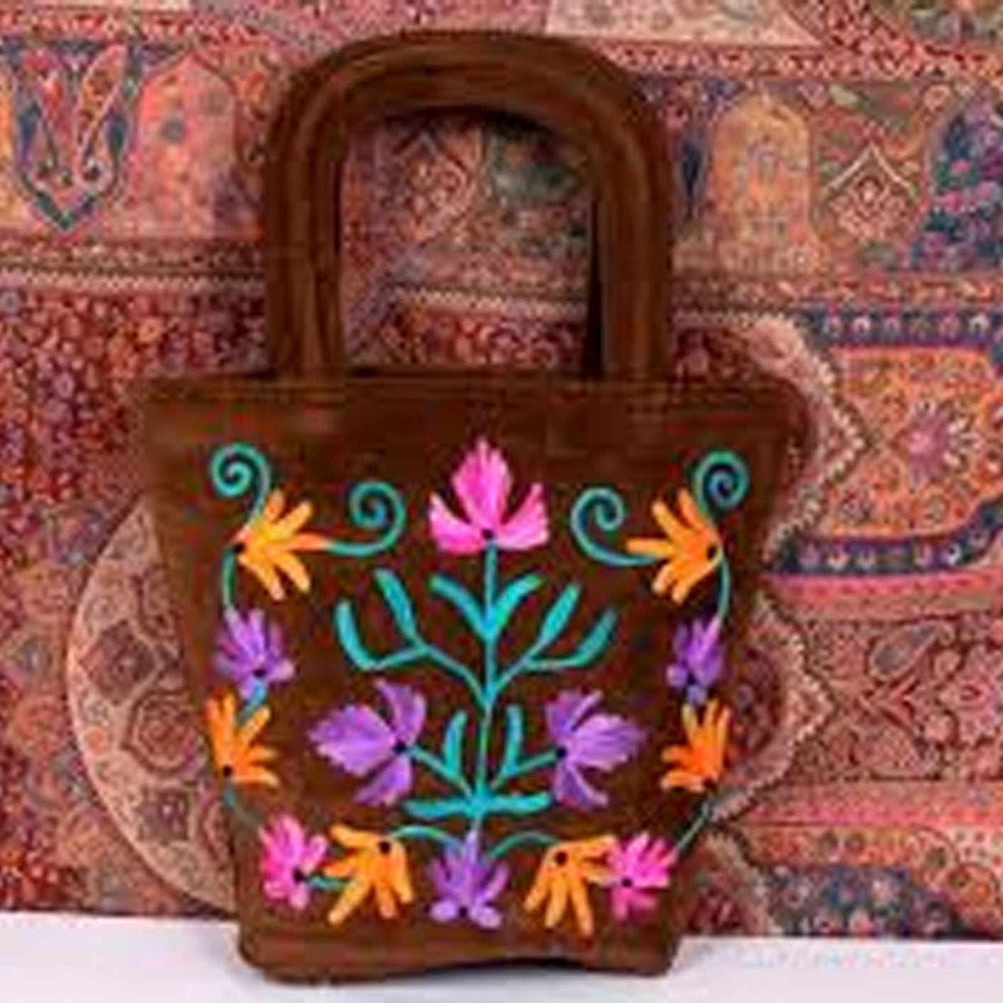Foral Embroidered Bag on a white surface