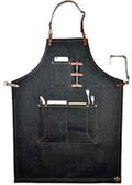 Black apron with tool belt on a white background
