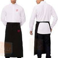 Person wearing a white shirt and black apron with red text on a white background