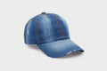 Blue denim cap with orange stitching on a white background