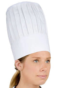 Person wearing a white chef's hat on a white background
