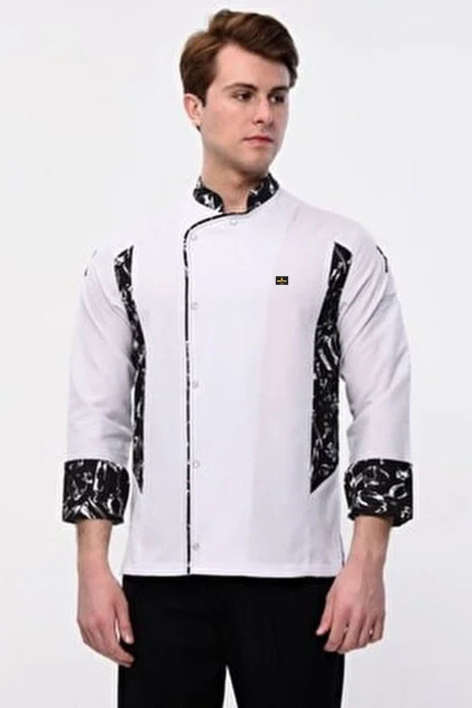Person wearing a white chef's jacket with black accents on a white background
