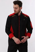 Man wearing a black and red jacket with embroidery on a white background