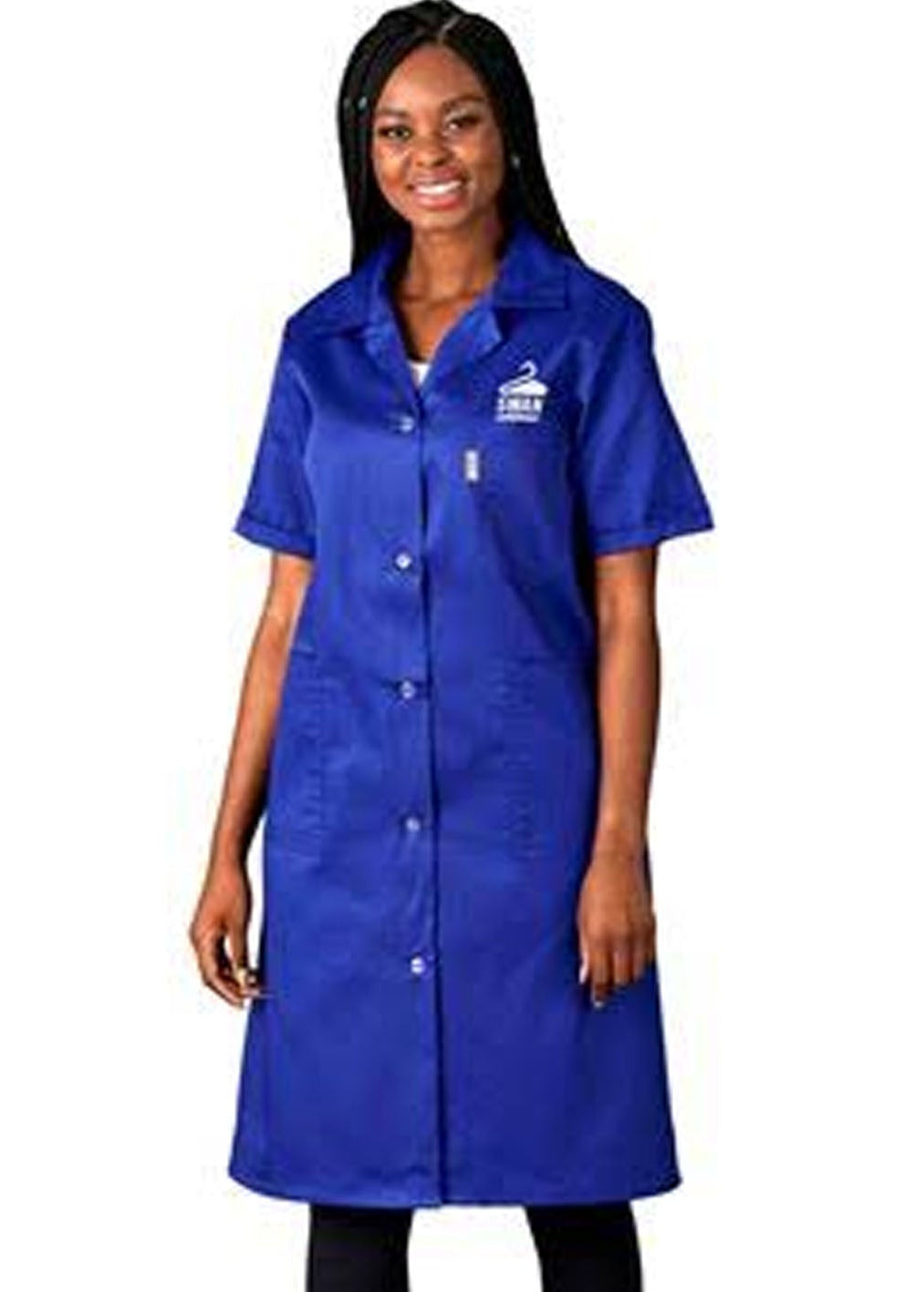 A woman modeling a royal blue short-sleeve lab coat with a white logo on the left chest, set against a plain white background.