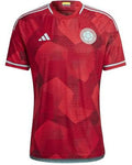 Red Colombia jersey with white lines