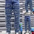 Two pairs of blue jeans displayed against a striped background.