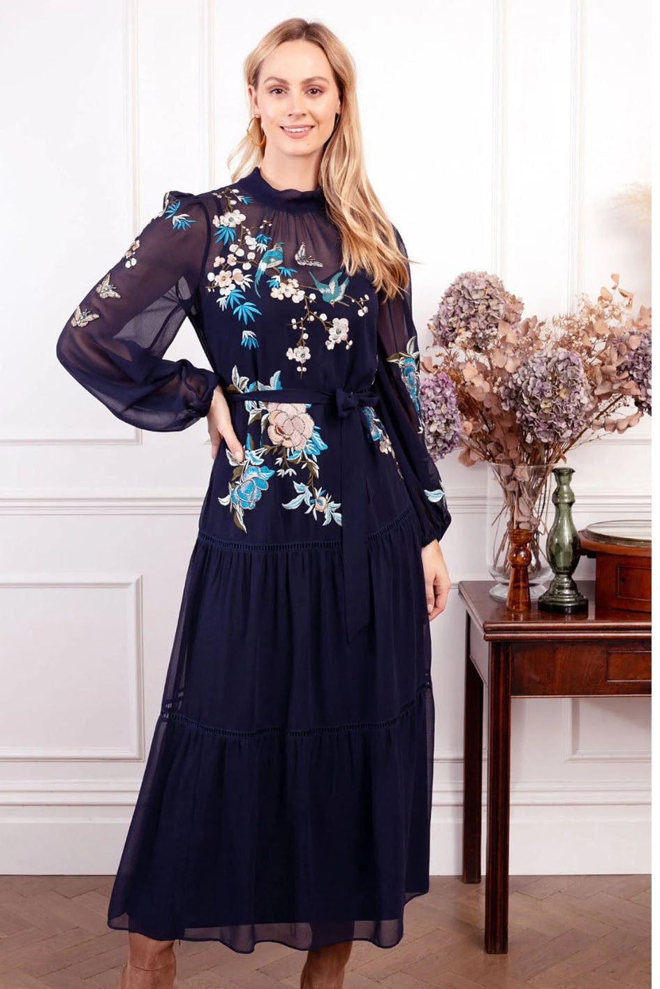 Lady with Navy blue Dress and floral embroidery
