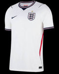 A white Nike England soccer jersey with navy and red trim, featuring the three lions crest and a star on the chest, displayed against a solid black background.