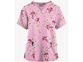 Pink floral patterned scrub top on a white background