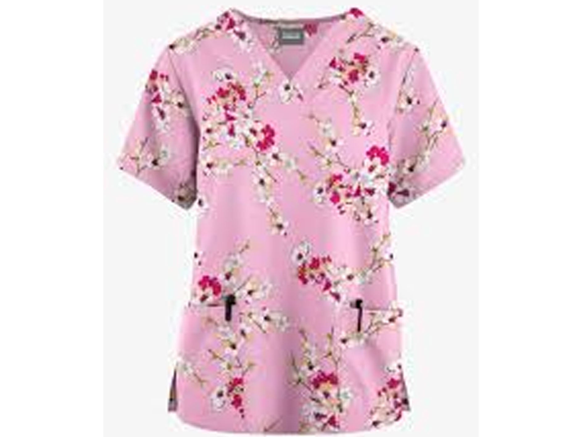 Pink floral patterned scrub top on a white background
