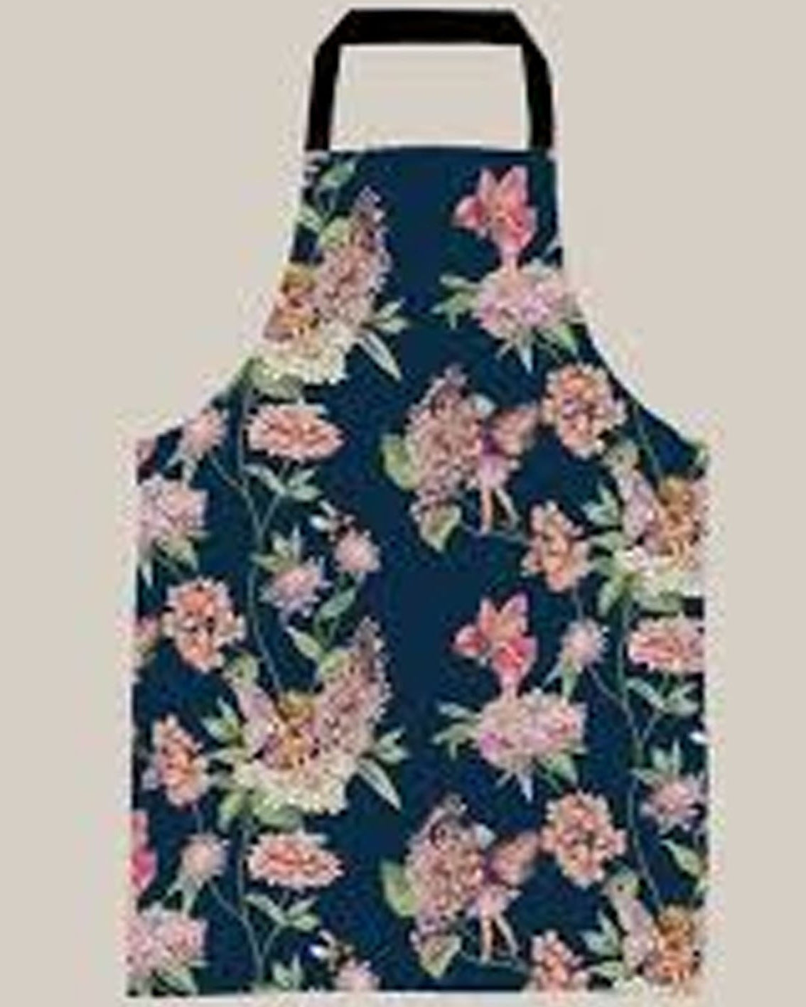 A dark navy apron with an all-over pink and green floral print, featuring a black neck strap, shown against a solid light beige background.