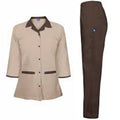 Beige jacket and brown pants on a white background