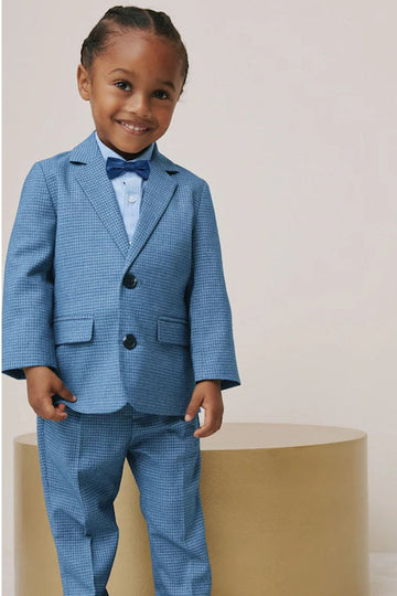 A boy with blue blazers