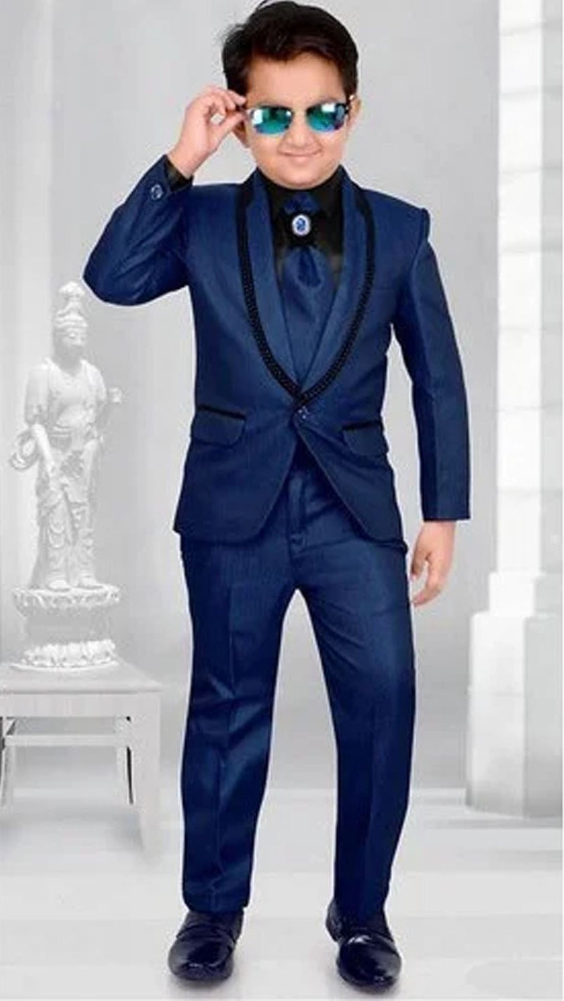 Person wearing a blue suit with sunglasses in a minimalistic setting