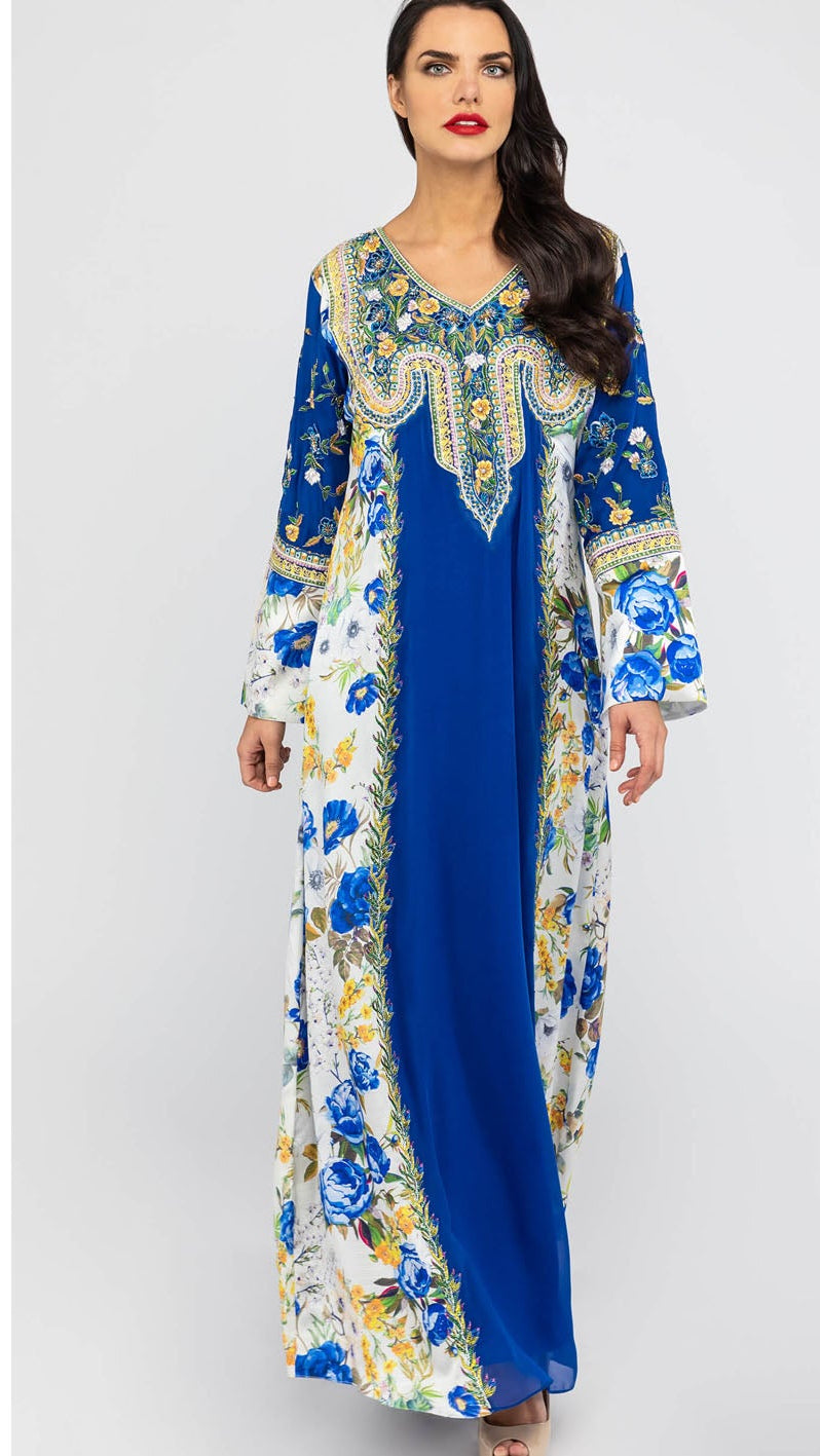 Woman wearing a blue floral dress on a white background