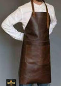 Brown leather apron worn by a person on a gray background