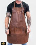 Man wearing a brown leather apron on a white background
