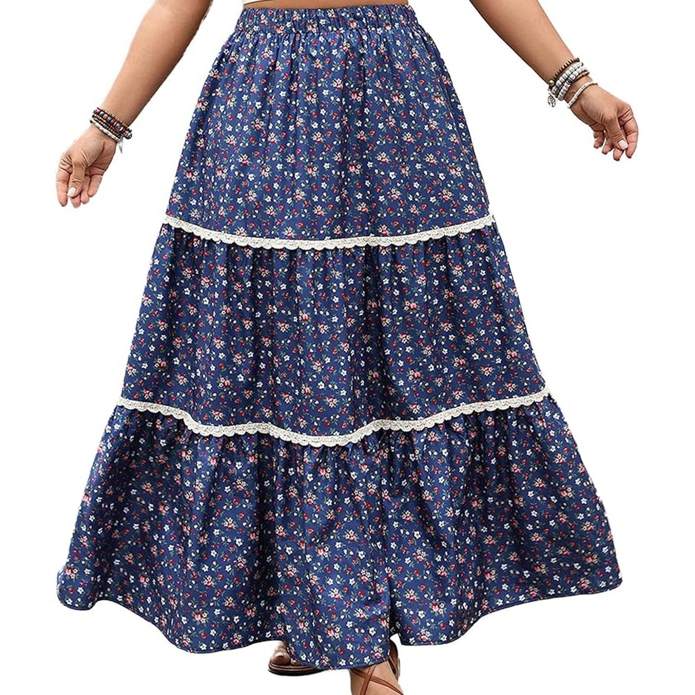 Navy blue floral skirt with white lace trim on a white background