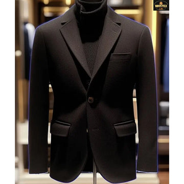 Black suit jacket on a mannequin with a blurred background