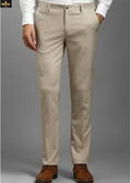Beige pants worn by a person on a gray background