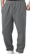 Gray sweatpants worn by a person on a white background