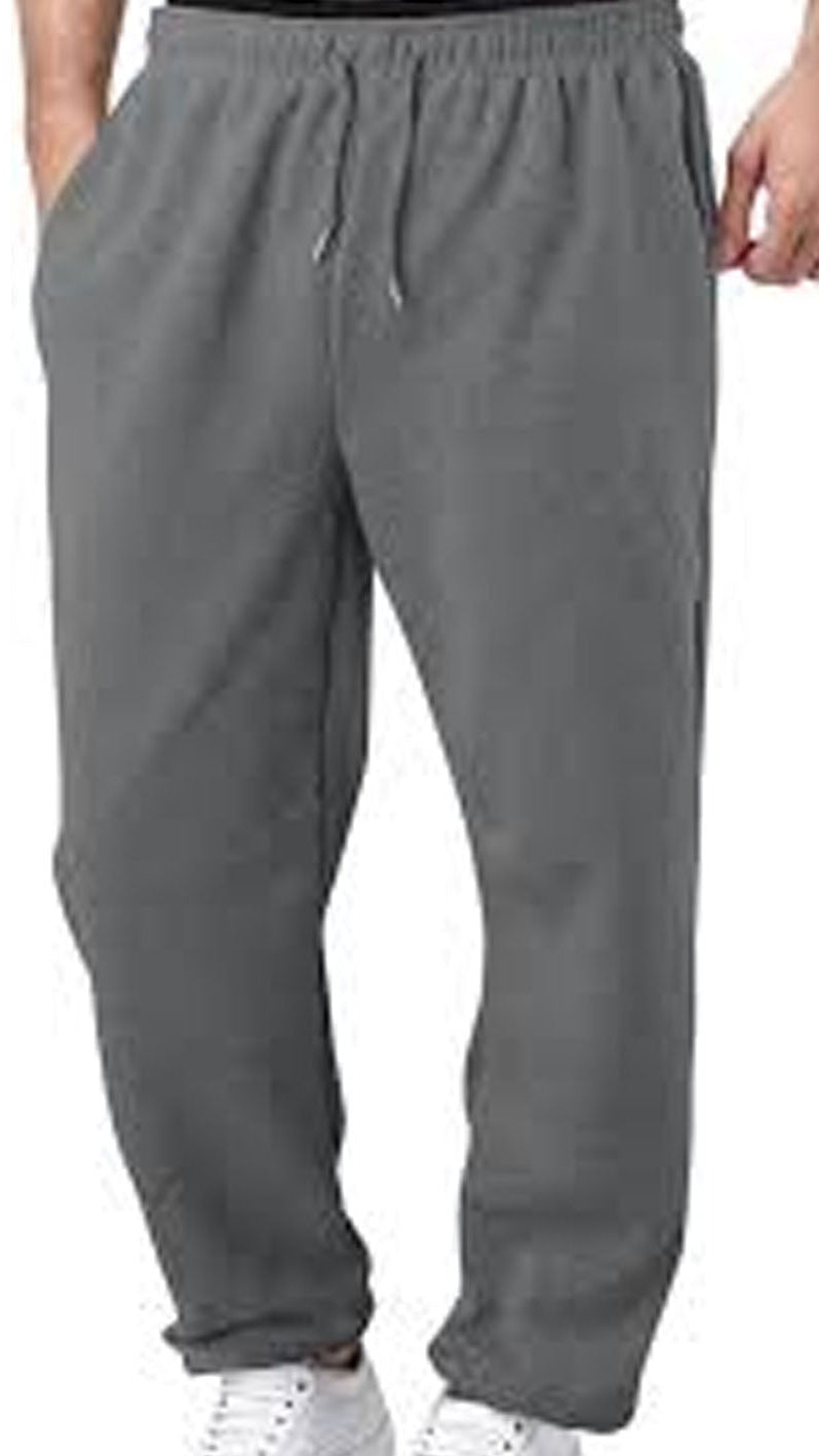 Gray sweatpants worn by a person on a white background