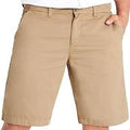 A person wearing khaki chino shorts with a white shirt partially visible at the top, shown against a plain white background.