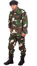 Person wearing a camouflage military uniform on a white background