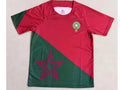 Red and green sports jersey with star design on a light gray background