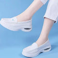 Nurse Legs wearing White Nurse Shoes