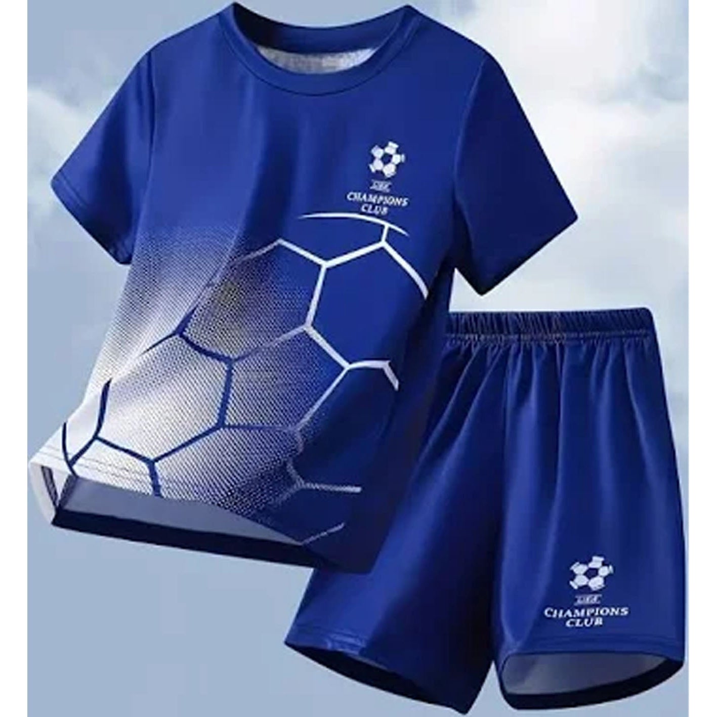 A blue soccer-themed t-shirt and shorts set with a Champions Club graphic and a soccer ball pattern gradient, shown against a light blue sky background.