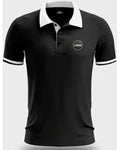 Black polo shirt with white collar and logo on a light gray background