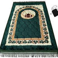 Green prayer mat with decorative design on a white background