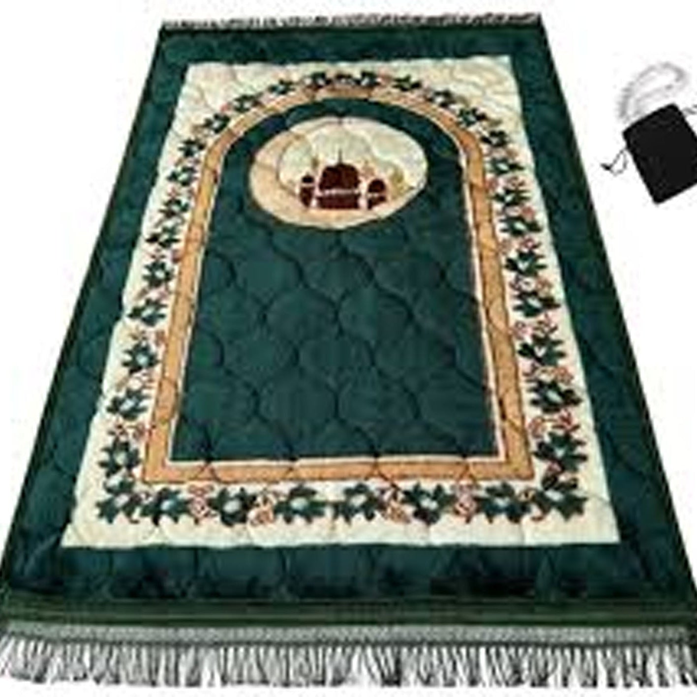 Green prayer mat with decorative design on a white background