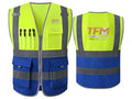 High-visibility yellow and blue utility work vest with reflective gray stripes, shown from the front and back. The front features a zipper, utility pockets, and tool loops, while the back displays a large orange and white TFM logo.