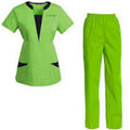 Green scrub set with black accents on a white background