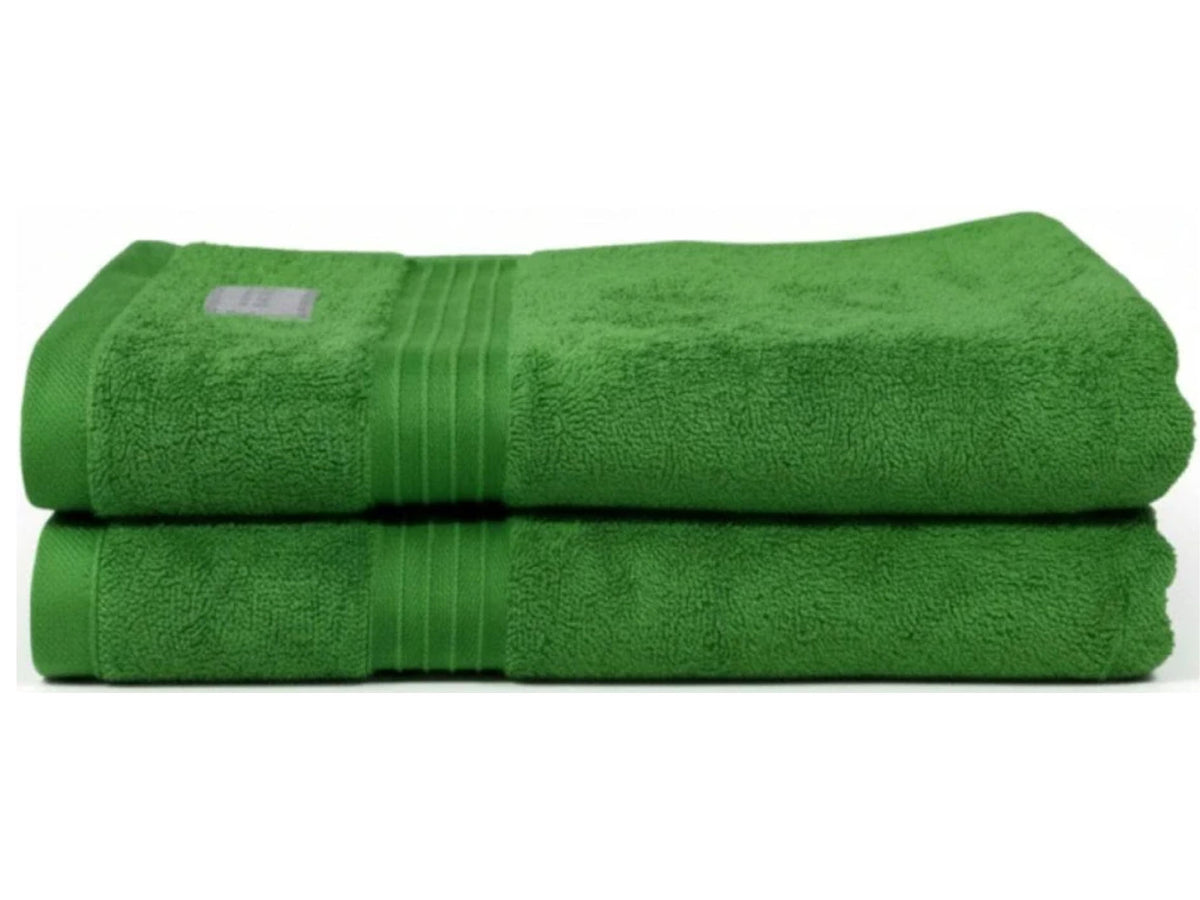 2 Torqouise green towels neatly folded