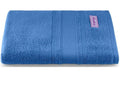 A Neatly folded blue torqouise bath towel