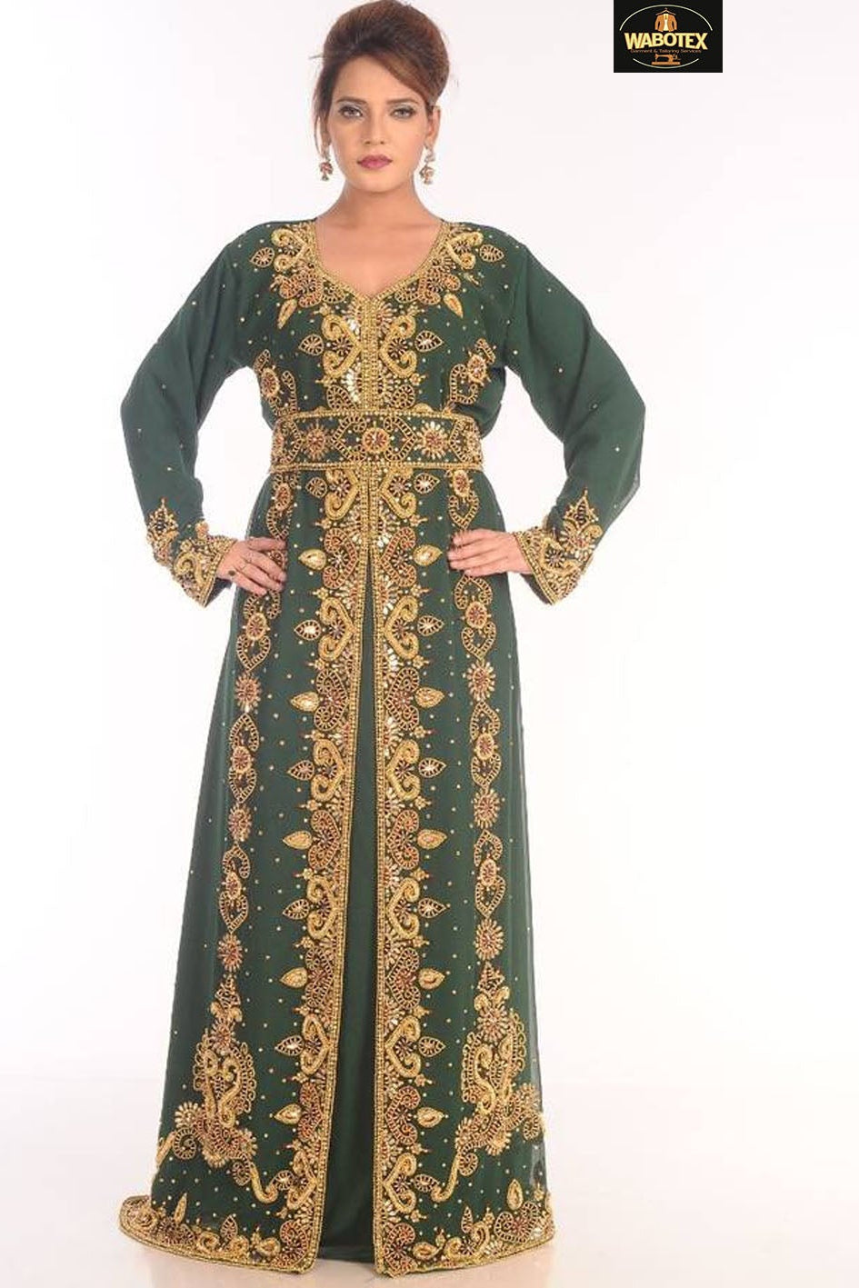 Green dress with gold embroidery on a white background