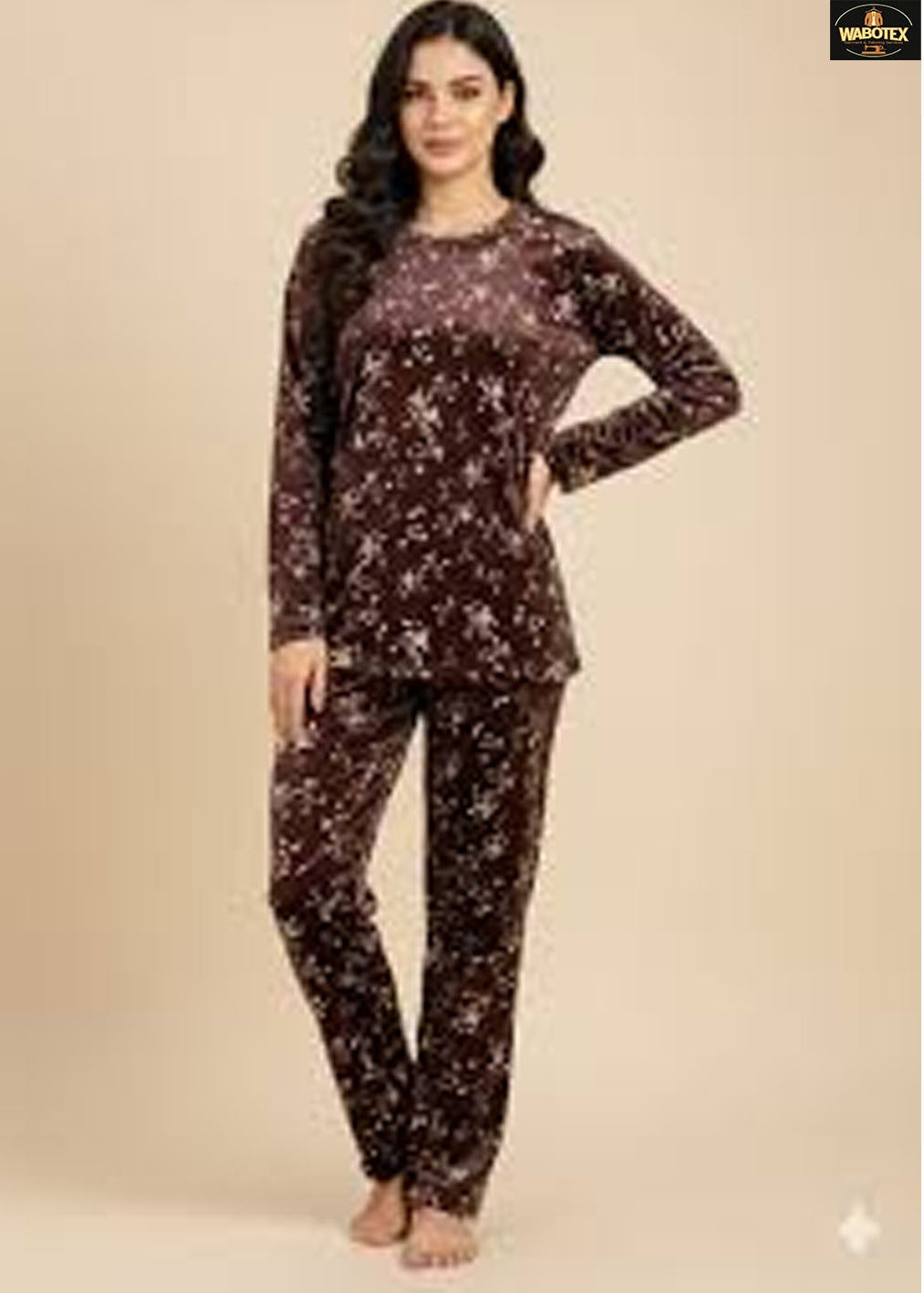 Woman wearing a floral pajama set on a beige background