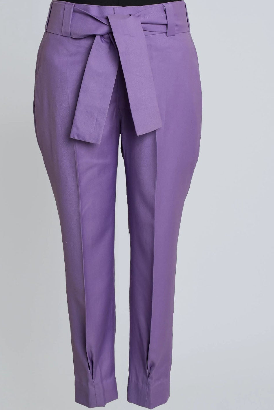 Purple pants with a belt on a light gray background