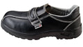 Black safety shoe with velcro closure on a white background