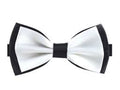 White bow tie with black edges on a white background