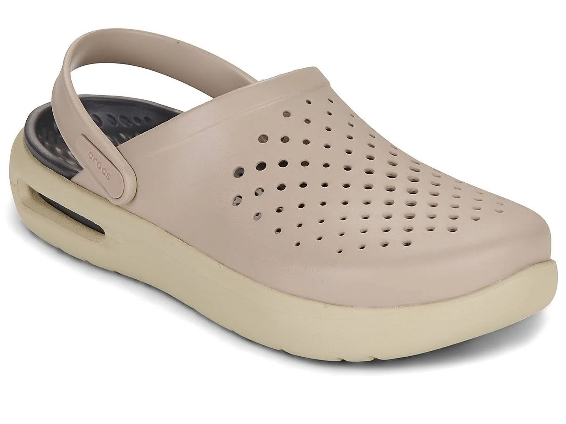 A single light beige perforated clog-style sandal with a thick cream sole and a dark gray footbed, shown on a white background.