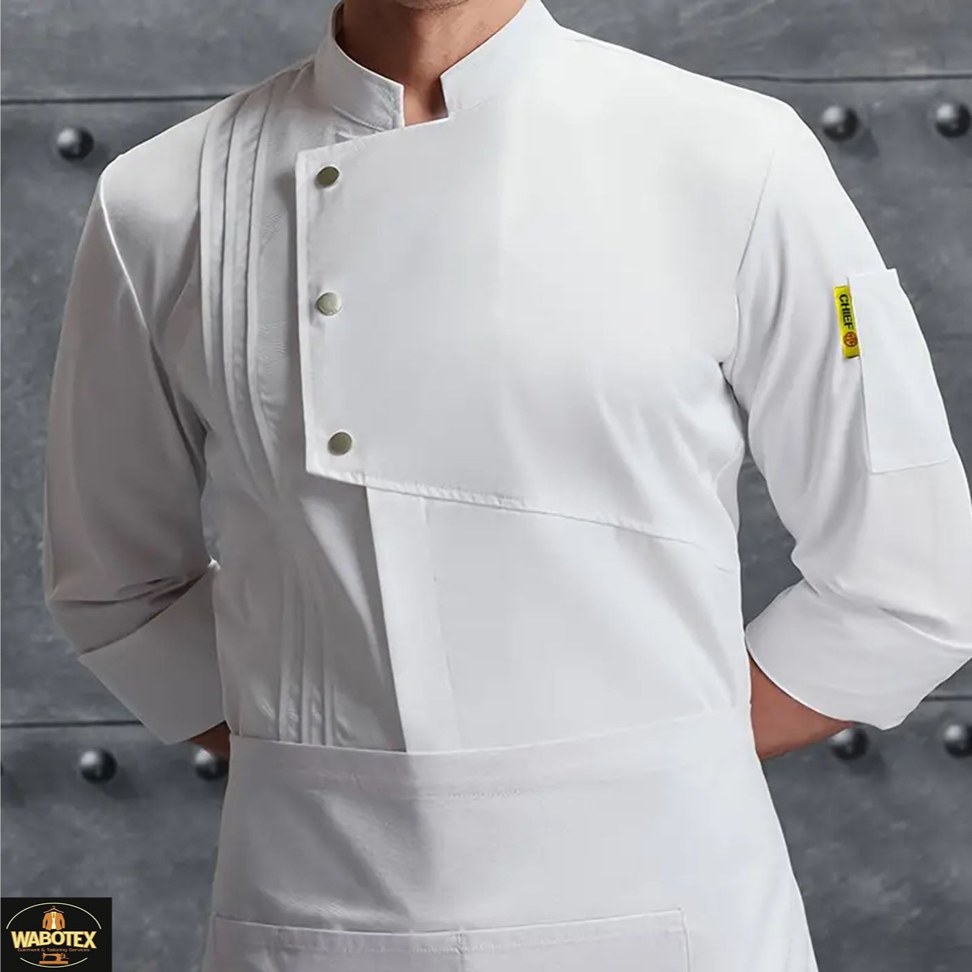 White chef's coat with buttons on a gray background