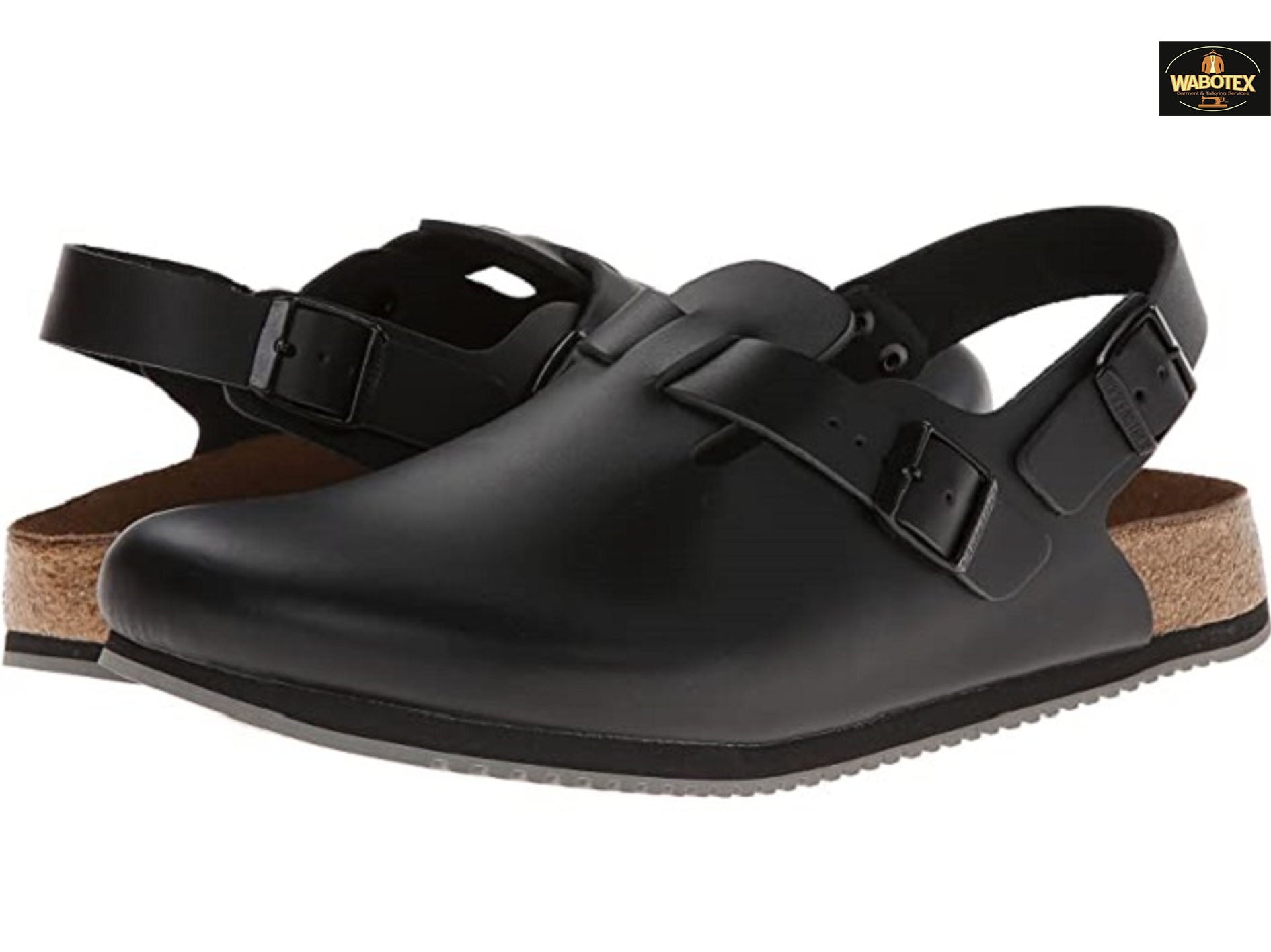 Black sandals with cork soles on a white background